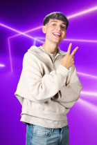 A picture containing person, wall Description automatically generated
